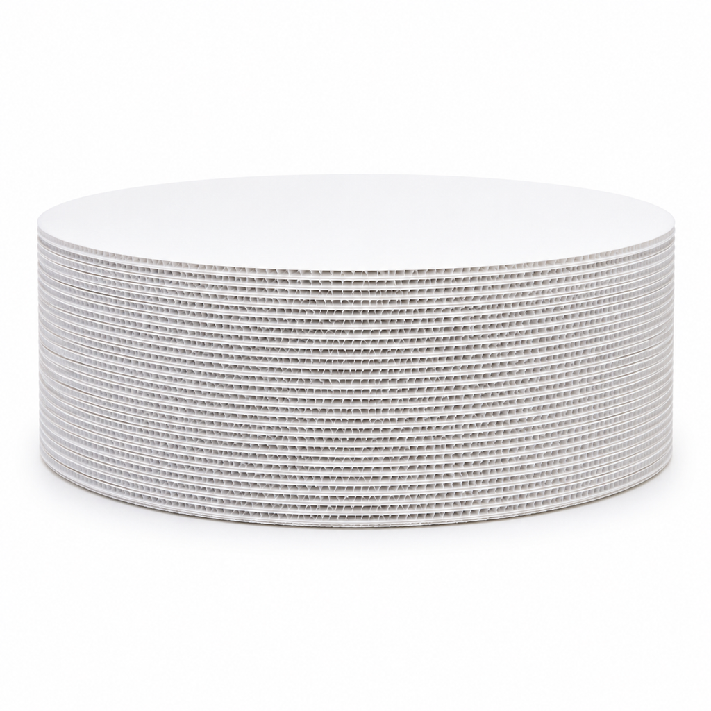Stack of 25 white round coroplast cake boards seen from the side, showing the full thickness of the pack