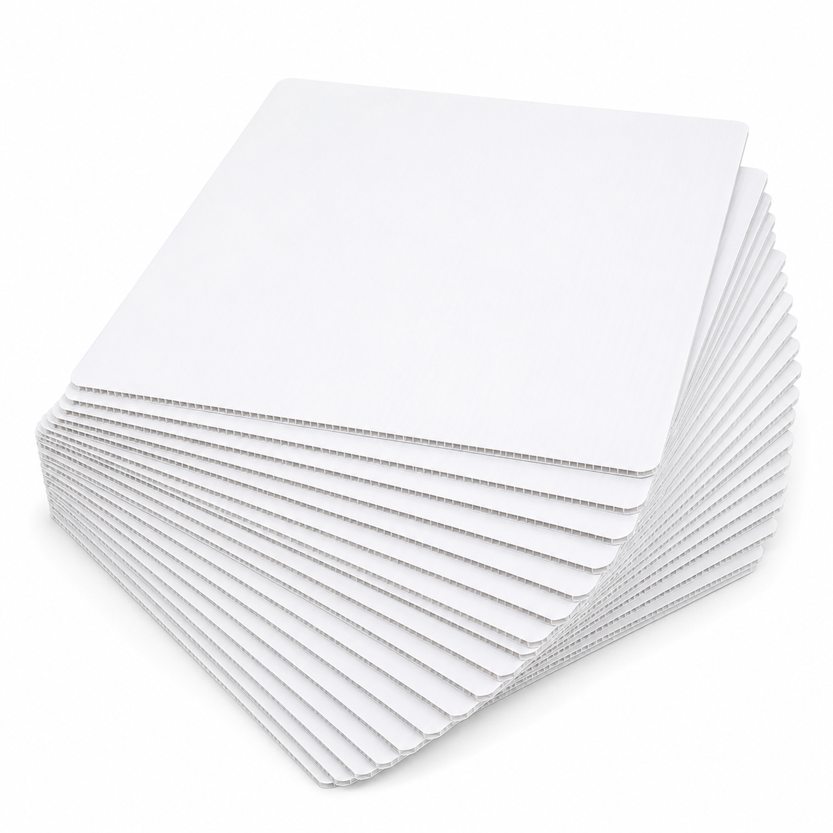 Pack of 25 white square coroplast cake boards fanned out, showing the 4mm corrugated plastic edge and clean cut corners