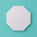 Octagon foam cake dummy 11 inch point to point, seen from above showing eight equal faces, smooth white finish