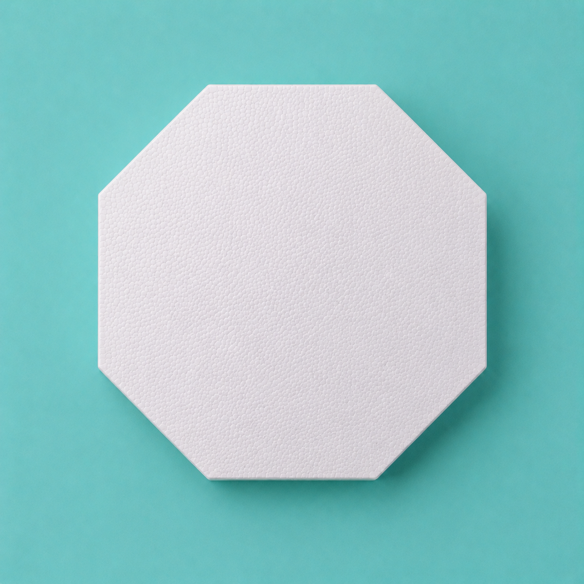 Octagon foam cake dummy 14 inch point to point base tier, seen from above showing eight equal faces, smooth white finish