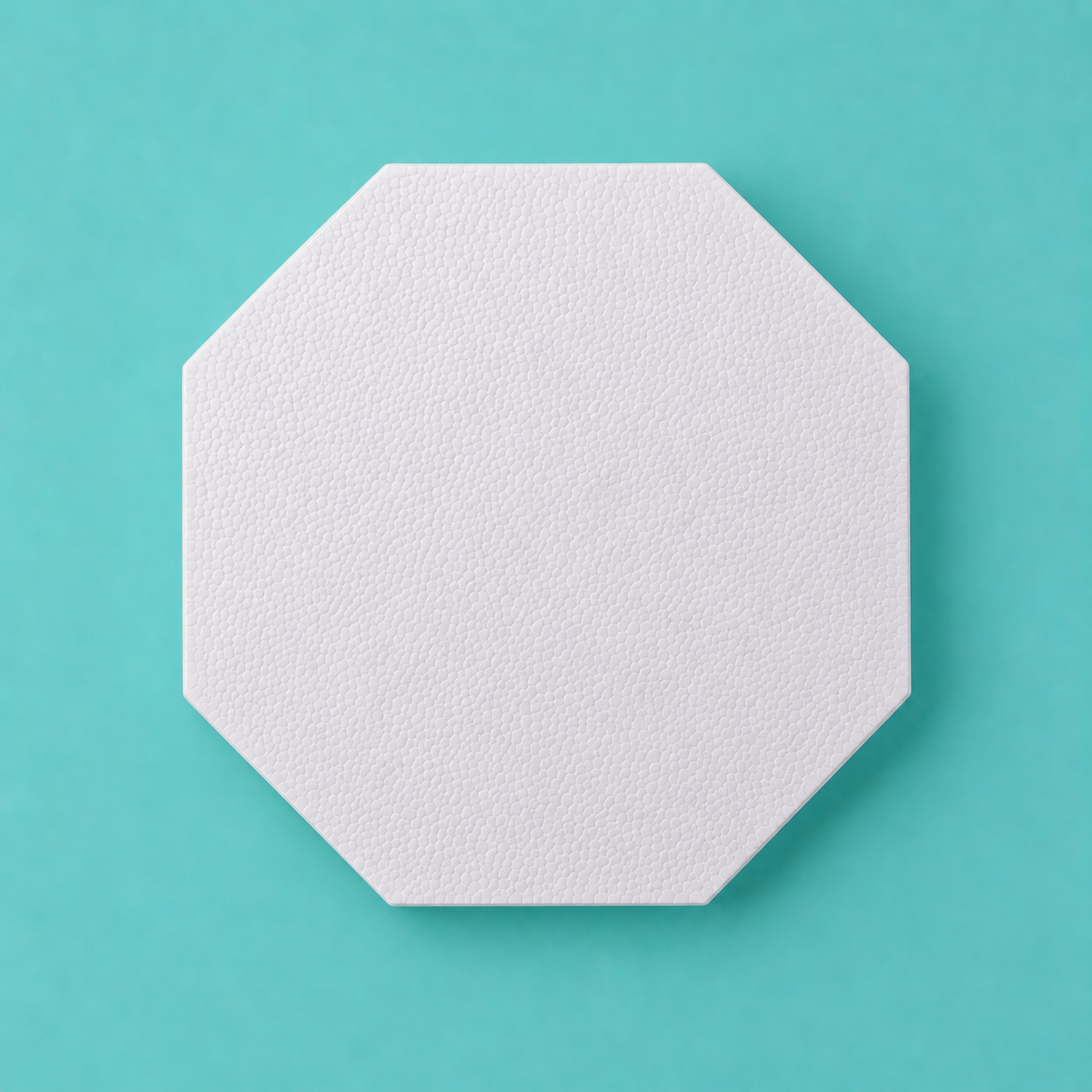 Octagon foam cake dummy 16 inch point to point base tier, seen from above showing eight equal faces, smooth white finish