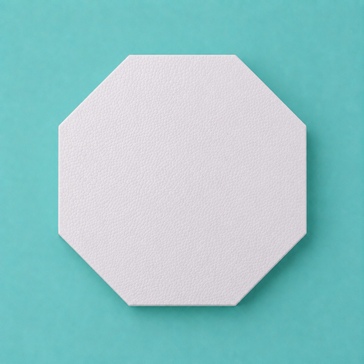 Octagon foam cake dummy 21 inch point to point base tier, seen from above showing eight equal faces, smooth white finish