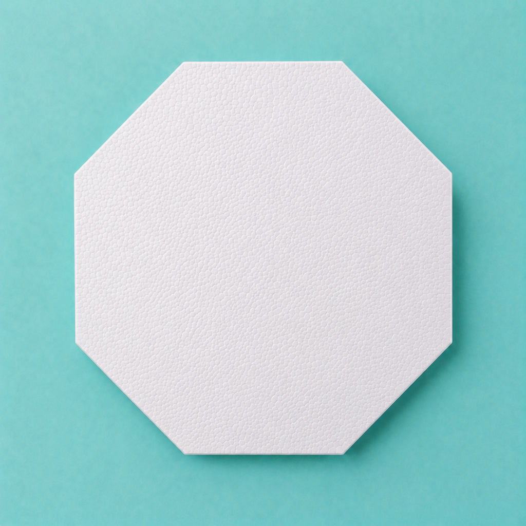 Octagon foam cake dummy 22 inch point to point, our largest base tier, seen from above showing eight equal faces, smooth white finish