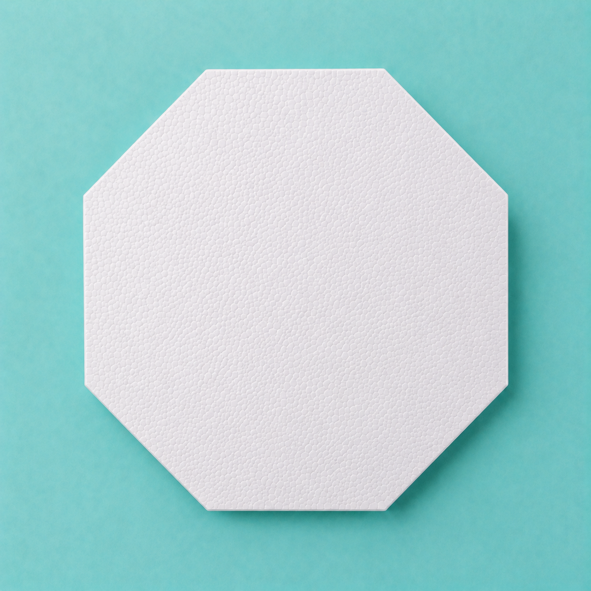 Octagon foam cake dummy 22 inch point to point, our largest base tier, seen from above showing eight equal faces, smooth white finish