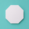 Octagon foam cake dummy 4 inch point to point, seen from above showing eight equal faces, smooth white finish