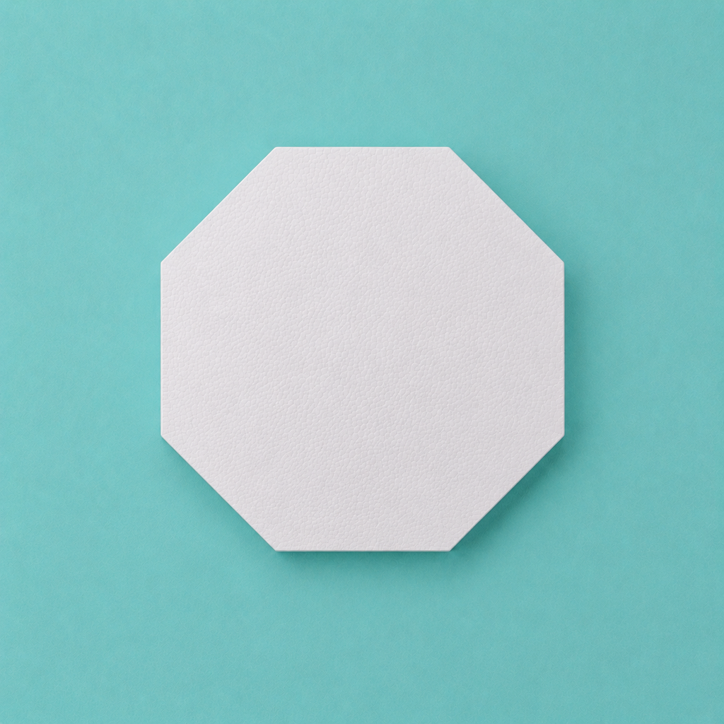 Octagon foam cake dummy 7 inch point to point, seen from above showing eight equal faces, smooth white finish