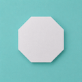 Octagon foam cake dummy 7 inch point to point, seen from above showing eight equal faces, smooth white finish