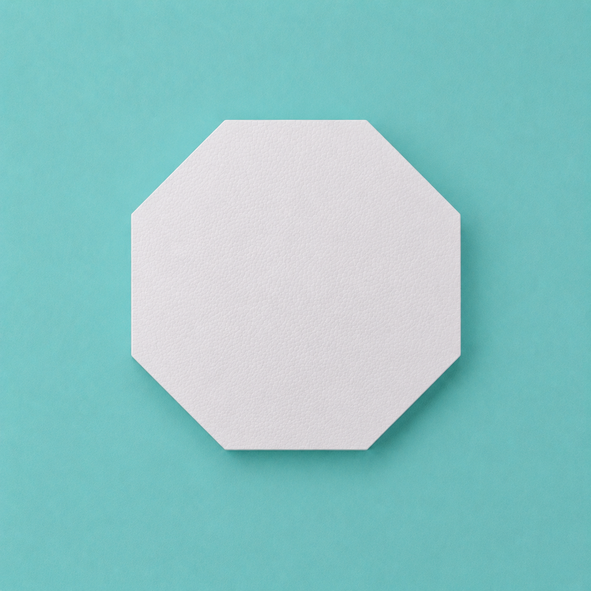 Octagon foam cake dummy 7 inch point to point, seen from above showing eight equal faces, smooth white finish