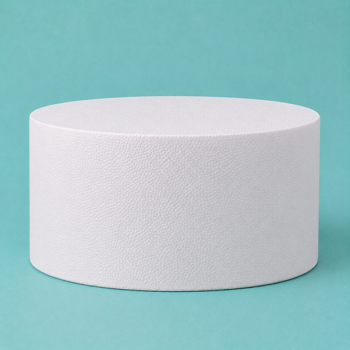 Oval foam cake dummy 12 by 9 inch seen from the front, showing the perpendicular side and crisp top rim
