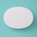 Oval foam cake dummy 12 by 9 inch, seen from above showing the true elliptical profile, smooth white finish