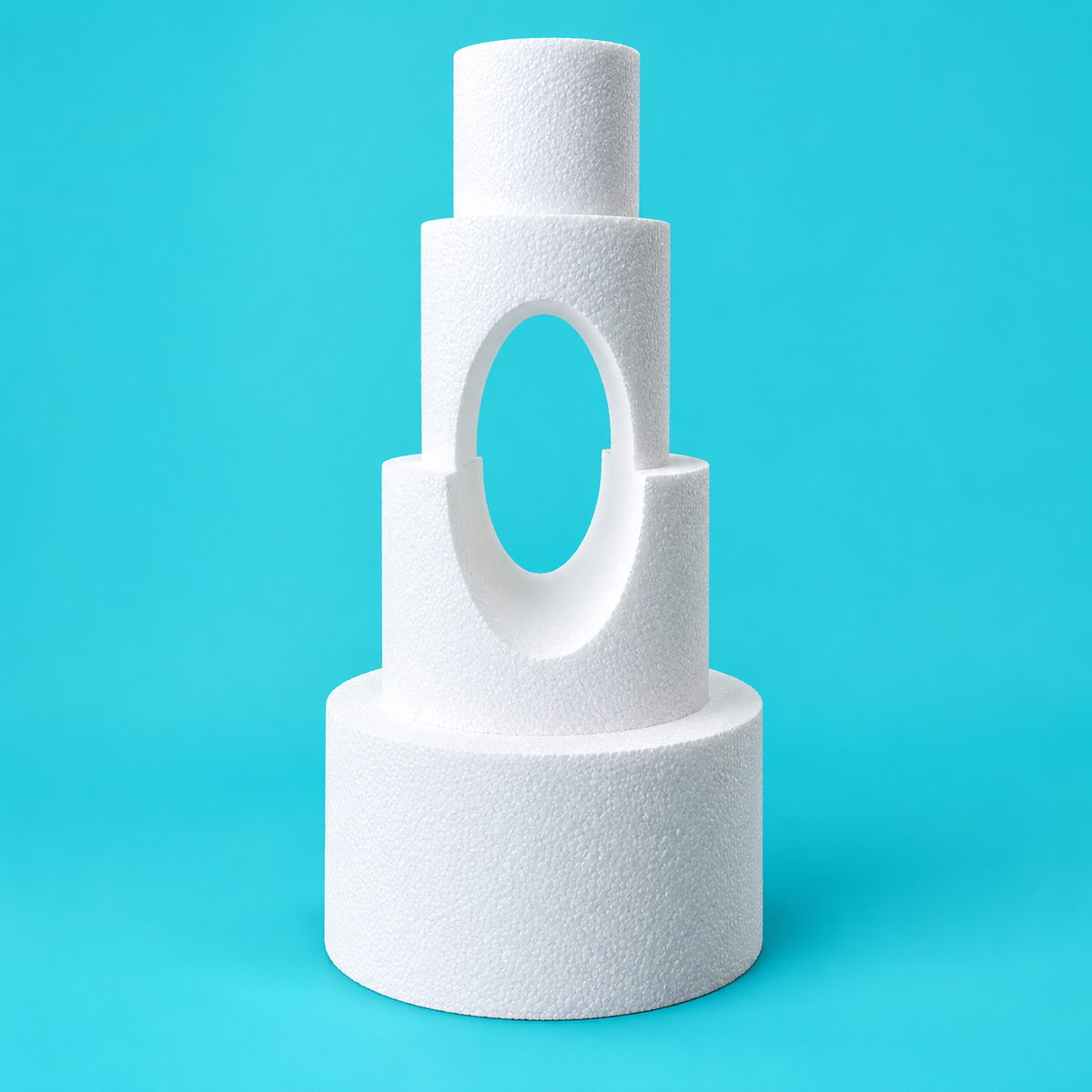 Four-tier round foam cake dummy tower with two arch cutouts, diameters 4, 6, 8 and 10 inches, smooth white finish