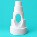 Five-tier round foam cake dummy wedding tower with vertical oval cutout, diameters 6, 8, 10, 12 and 14 inches, smooth white finish