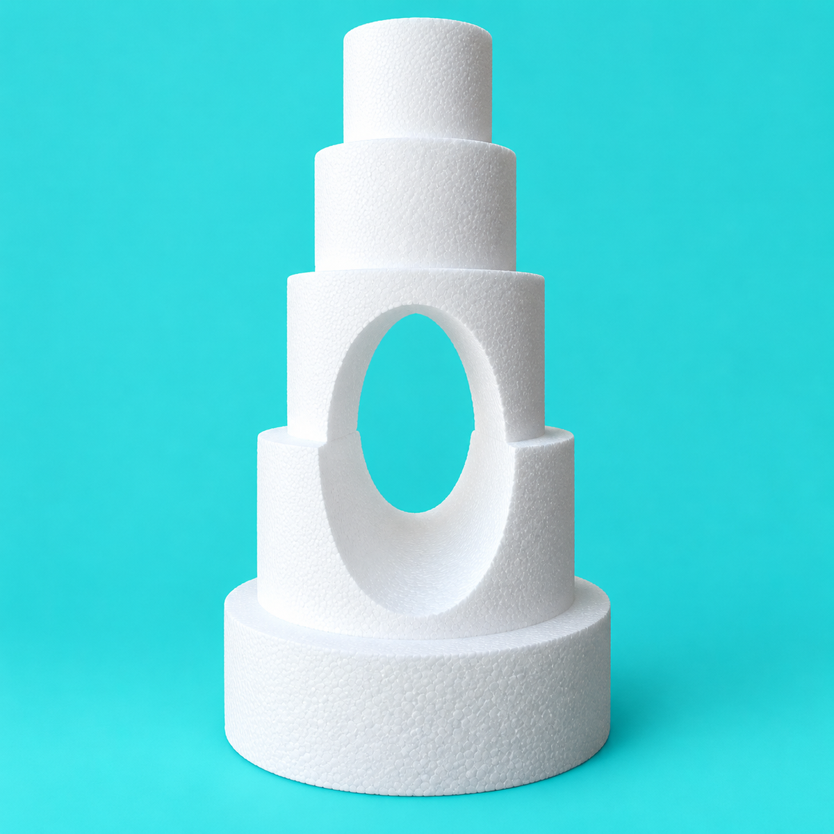 Five-tier round foam cake dummy wedding tower with vertical oval cutout, diameters 6, 8, 10, 12 and 14 inches, smooth white finish